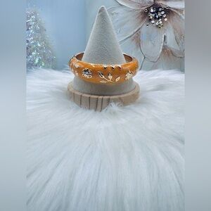The Orange and Gold Thick Enamel Floral Design Bangle Bracelet